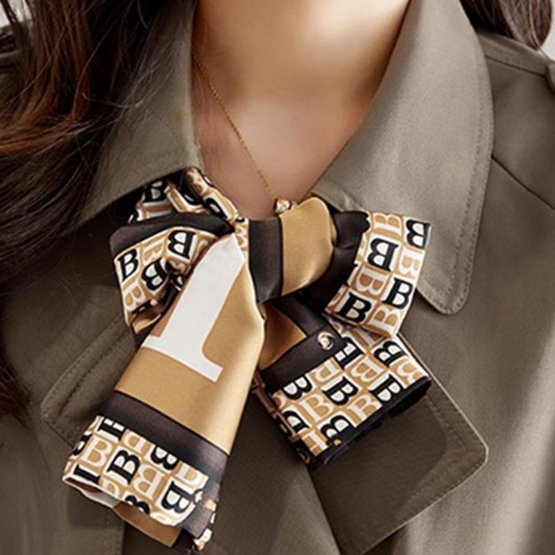 Trench-coat mi-long amincissant Ă revers pour femmes